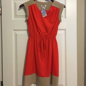 Size small orange dress. Never worn.